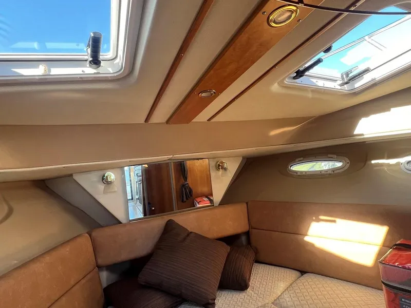 Slide: The Image of Interior of 2016 Cutwater C-28 boat with cozy seating and skylights. - 43