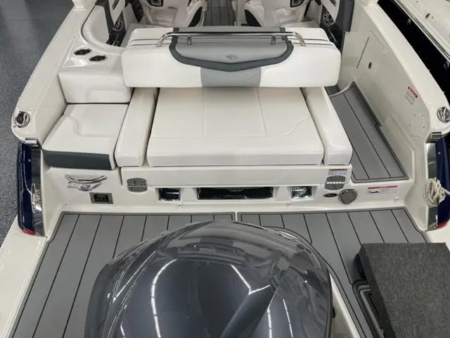 Slide: The Image of 2021 Chaparral 267 SSX OB boat interior with sleek seating and modern design. - 19