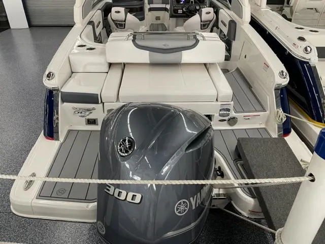 Slide: The Image of 2021 Chaparral 267 SSX OB boat with Yamaha 300 outboard motor, interior view. - 2
