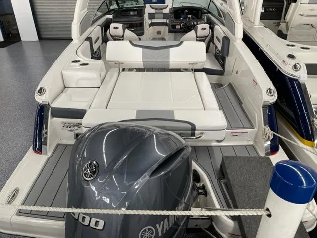 Slide: The Image of 2021 Chaparral 267 SSX OB boat interior with Yamaha outboard motor. - 20