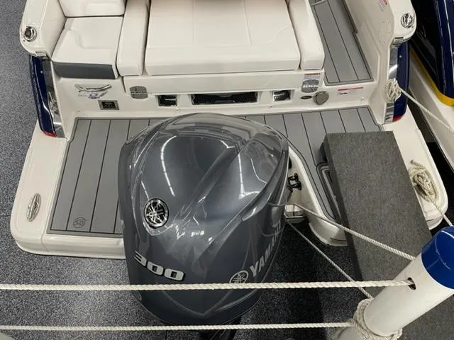 Slide: The Image of 2021 Chaparral 267 SSX OB boat with Yamaha 300 outboard motor, rear view. - 21