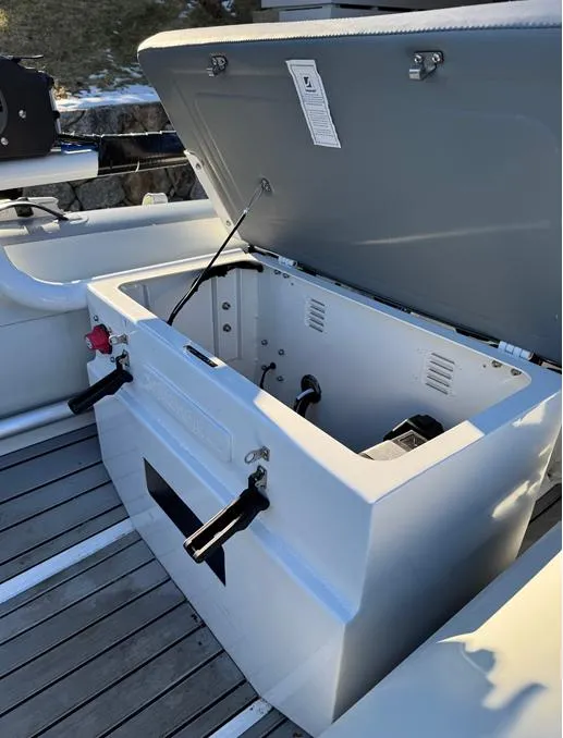 Slide: The Image of 2023 Highfield Classic 310 FCT boat storage compartment open on deck. - 6