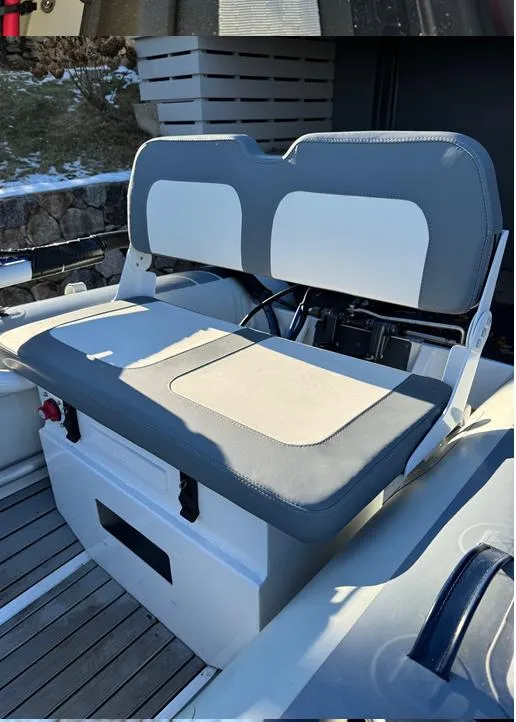 Slide: The Image of 2023 Highfield Classic 310 FCT boat seat with gray and white upholstery. - 7