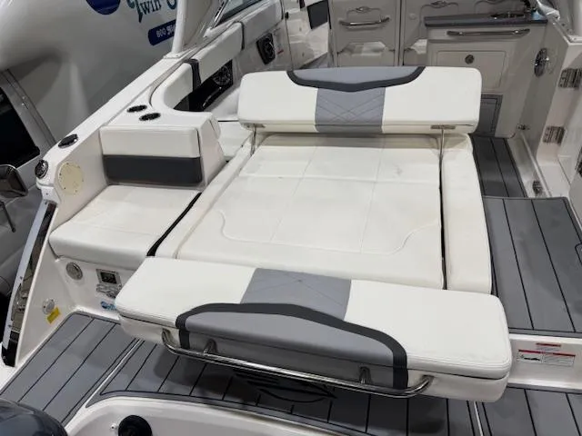 Slide: The Image of 2022 Chaparral 280 OSX boat interior with adjustable seating and modern design. - 28