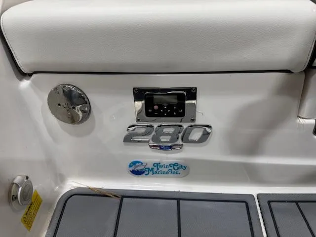 Slide: The Image of 2022 Chaparral 280 OSX boat interior with Twin City Marine logo. - 29