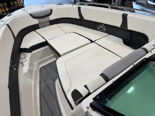 Slide: The Image of 2022 Chaparral 280 OSX boat interior with spacious seating and modern design. - 8