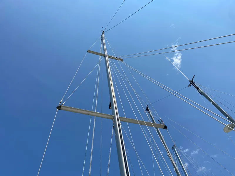 Slide: The Image of Sailboat mast against clear blue sky, Ericson 39 Flushdeck, 1972 model. - 20