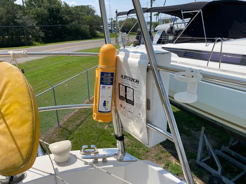 Slide: The Image of 1972 Ericson 39 Flushdeck sailboat with lifesaving equipment on deck. - 29