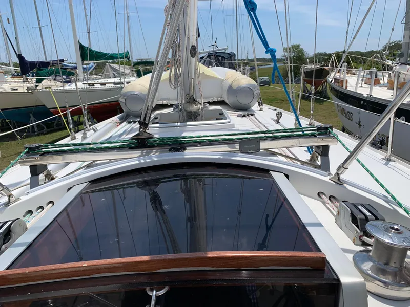 Slide: The Image of 1972 Ericson 39 Flushdeck sailboat deck with rigging and winches. - 45