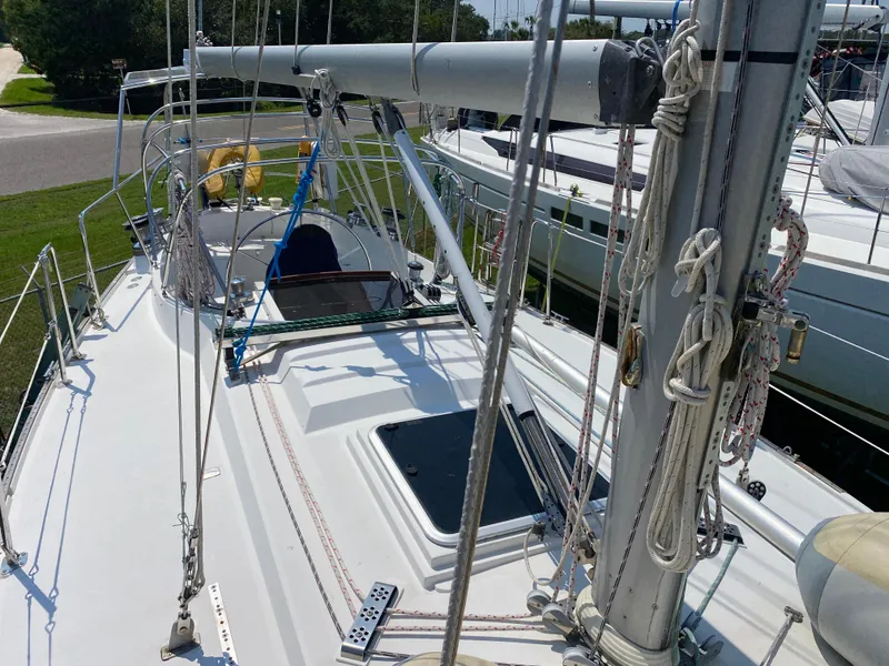 Slide: The Image of 1972 Ericson 39 Flushdeck sailboat deck with rigging and mast. - 53