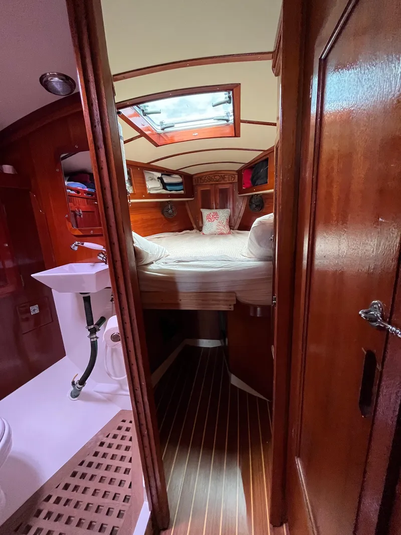 Slide: The Image of Interior of 1972 Ericson 39 Flushdeck sailboat with cozy cabin and wooden finishes. - 77