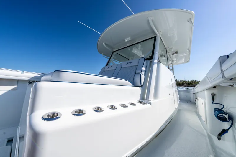 Slide: The Image of 2019 Yellowfin 42 Offshore boat with sleek design and spacious deck. - 15