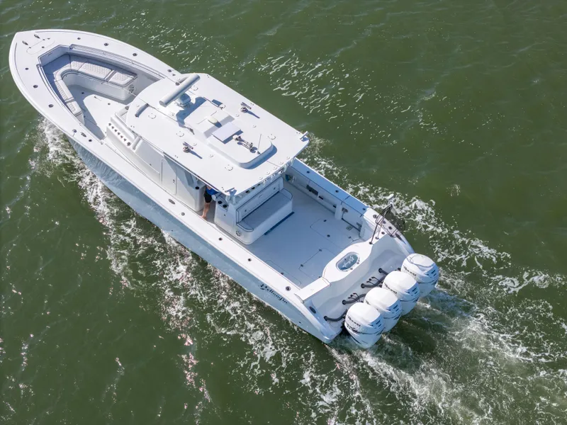 Slide: The Image of 2019 Yellowfin 42 Offshore boat cruising on open water. - 6