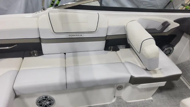 Slide: The Image of 2024 Formula 270 Bowrider interior with sleek white seating and modern design. - 19