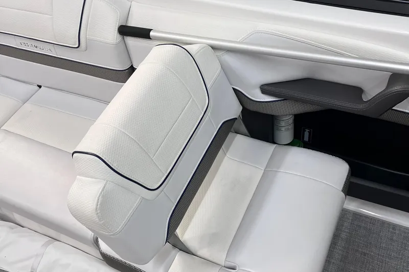 Slide: The Image of 2024 Formula 270 Bowrider interior with white leather seating and modern design. - 26