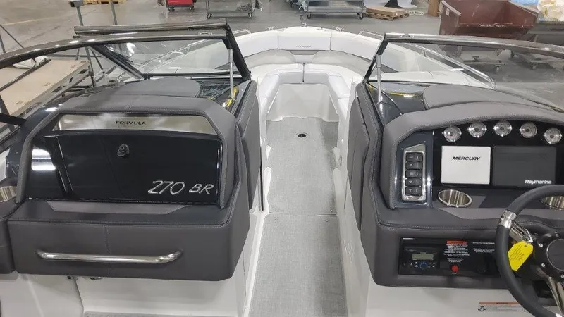 Slide: The Image of 2024 Formula 270 Bowrider interior with modern dashboard and seating. - 28