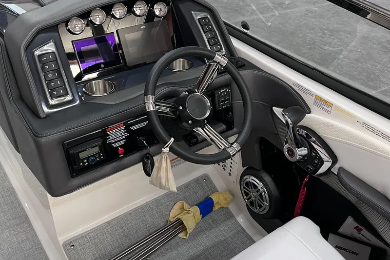 Slide: The Image of 2024 Formula 270 Bowrider dashboard with steering wheel and control panel. - 29