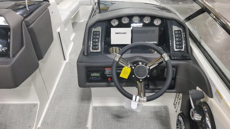 Slide: The Image of 2024 Formula 270 Bowrider dashboard with steering wheel and control panel. - 30