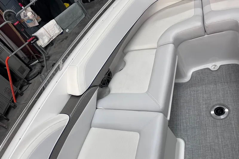 Slide: The Image of 2024 Formula 270 Bowrider interior with sleek white seating and modern design. - 36