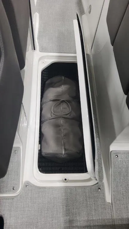 Slide: The Image of 2024 Formula 270 Bowrider under-seat storage with a bag inside. - 39