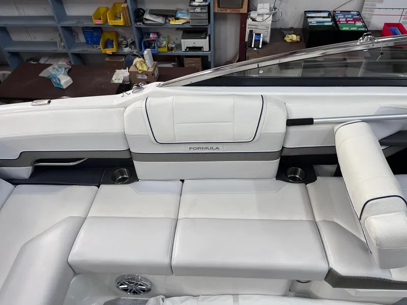 Slide: The Image of 2024 Formula 270 Bowrider interior with white seating and modern design. - 42