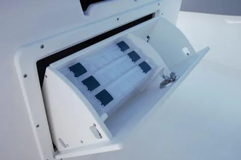 Slide: The Image of Cape Horn 32xs 2024 boat storage compartment with secure latch. - 9