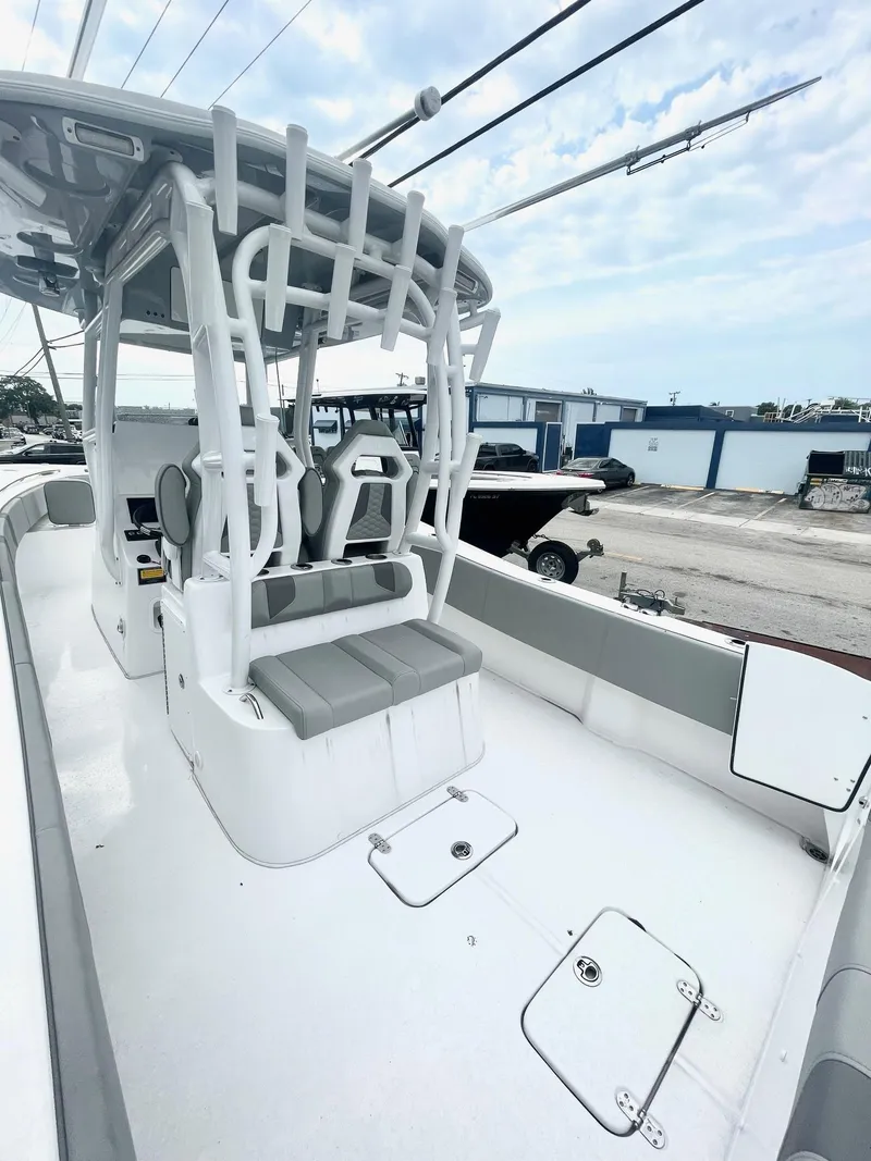 Slide: The Image of 2024 Cape Horn 32xs boat interior with seating and rod holders. - 4