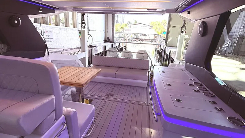 Slide: The Image of Luxurious interior of 2025 Schaefer 375 yacht with modern seating and ambient lighting. - 19