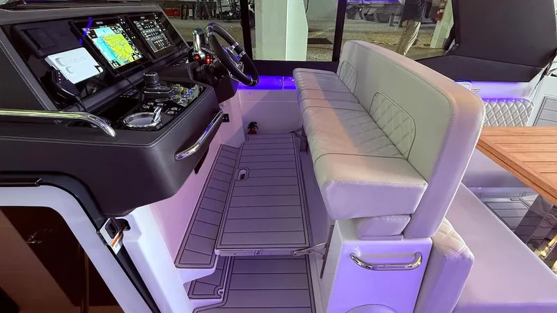 Slide: The Image of Luxury interior of 2025 Schaefer 375 yacht with modern helm and seating. - 33