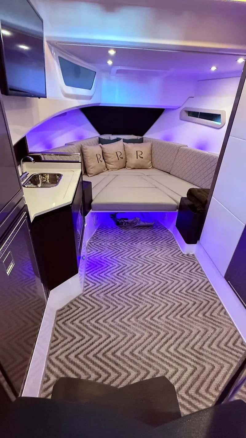 Slide: The Image of Luxurious interior of 2025 Schaefer 375 yacht with modern lighting and cozy seating. - 37