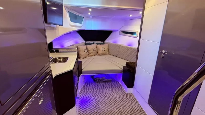 Slide: The Image of Luxurious interior of 2025 Schaefer 375 yacht with modern lighting and cozy seating. - 38
