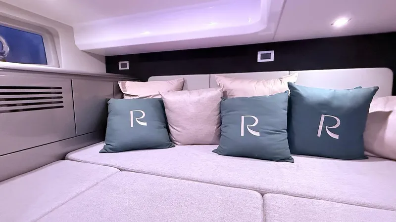 Slide: The Image of Luxurious interior of 2025 Schaefer 375 yacht with stylish cushions and modern design. - 42