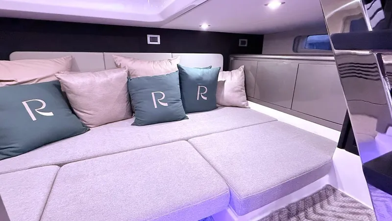 Slide: The Image of Luxurious interior of 2025 Schaefer 375 yacht with plush seating and elegant cushions. - 43