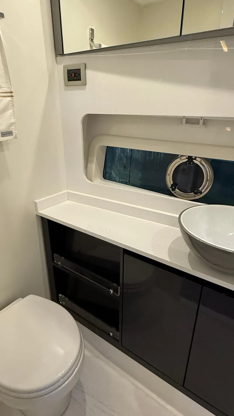 Slide: The Image of Modern bathroom in 2025 Schaefer 375 yacht with sleek fixtures and porthole window. - 49