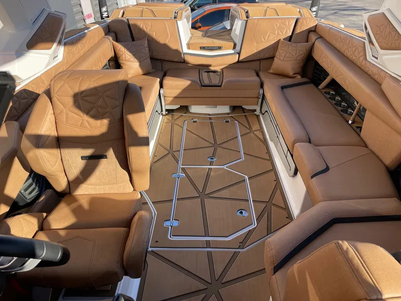 Slide: The Image of Luxurious interior of 2024 Nautique Super Air Nautique G25 Paragon boat. - 12