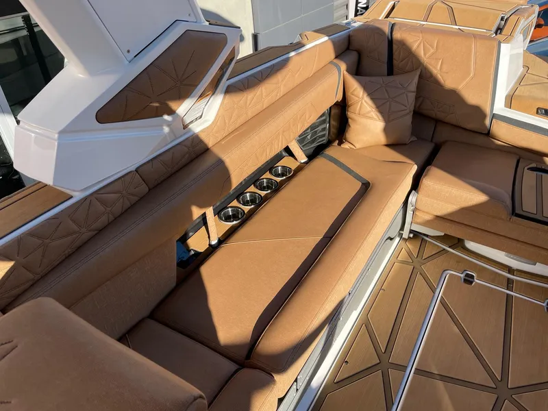 Slide: The Image of Luxurious interior of 2024 Nautique Super Air Nautique G25 Paragon boat. - 7