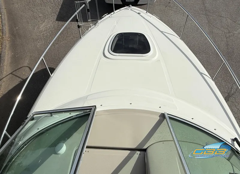 Slide: The Image of 2007 Sea Ray 240 Sundancer boat deck, top view with hatch and railing. - 38