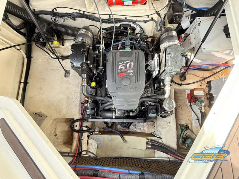 Slide: The Image of Engine compartment of a 2007 Sea Ray 240 Sundancer boat. - 40