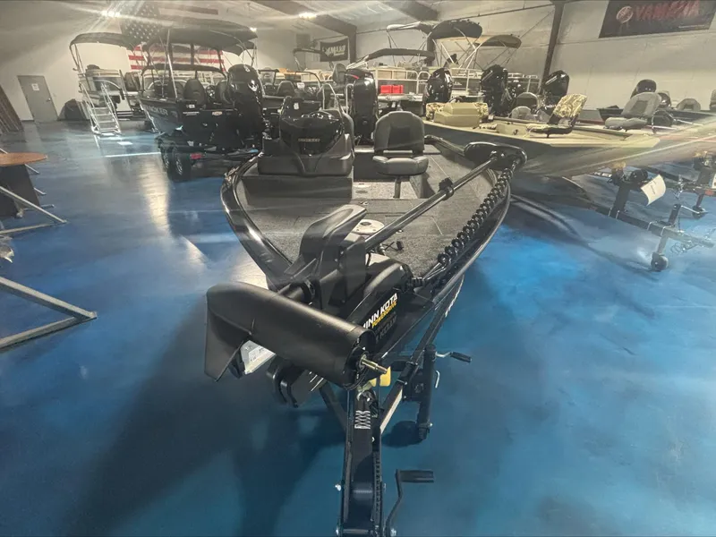 Slide: The Image of 2025 Tracker SG V16 SC boat in showroom, featuring sleek design and modern equipment. - 7