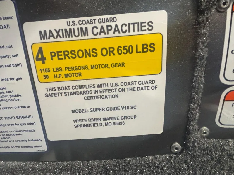 Slide: The Image of U.S. Coast Guard capacity label for 2025 Tracker SG V16 SC boat, 4 persons or 650 lbs. - 9