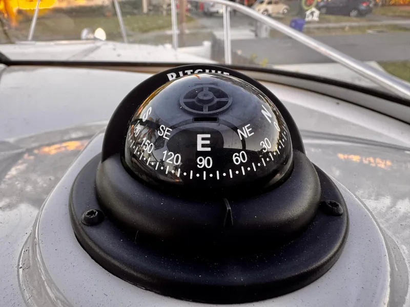 Slide: The Image of Compass on 2020 Regal 26XO boat dashboard, showing east direction. - 40