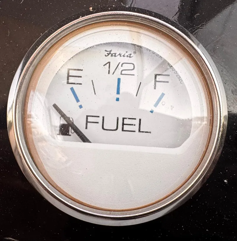 Slide: The Image of Fuel gauge of a 2020 Regal 26XO boat showing empty. - 42