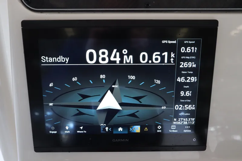 Slide: The Image of Garmin navigation display on 2024 Grady-White Fisherman 216 boat, showing compass and speed data. - 26