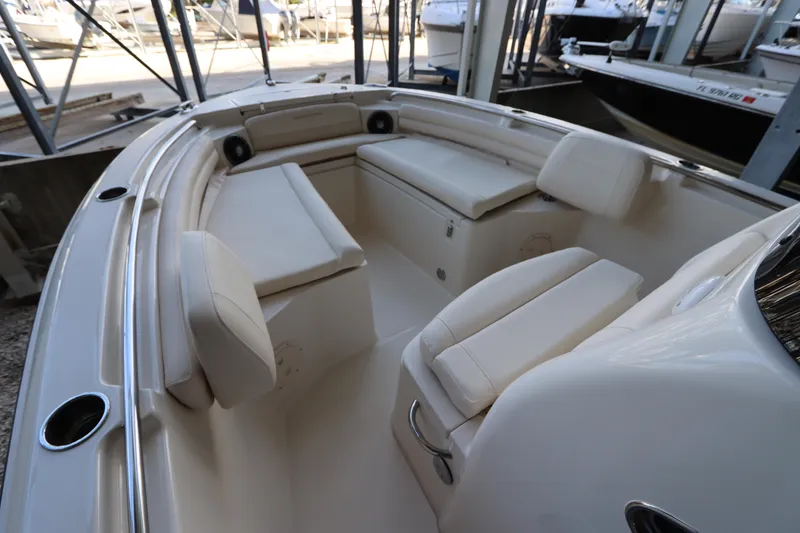 Slide: The Image of 2024 Grady-White Fisherman 216 boat interior with cushioned seating. - 29