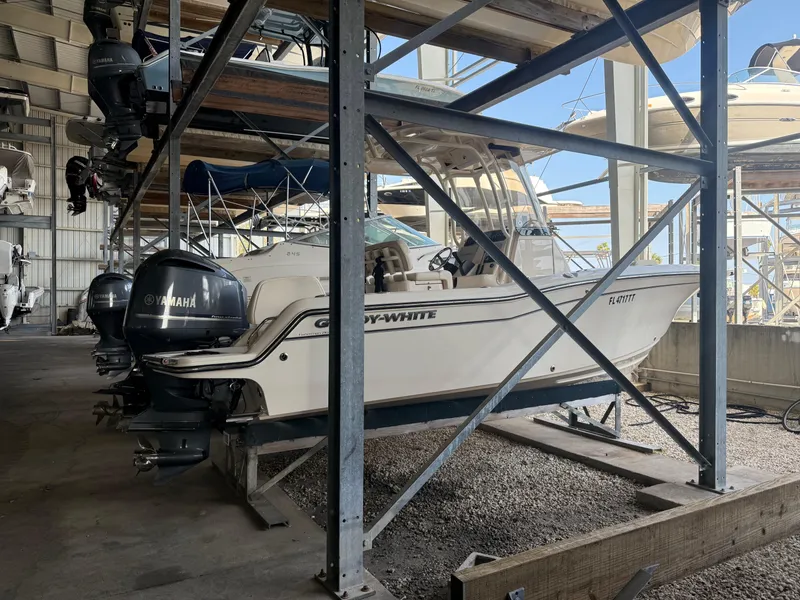 Slide: The Image of 2024 Grady-White Fisherman 216 boat in storage, featuring Yamaha engines. - 3