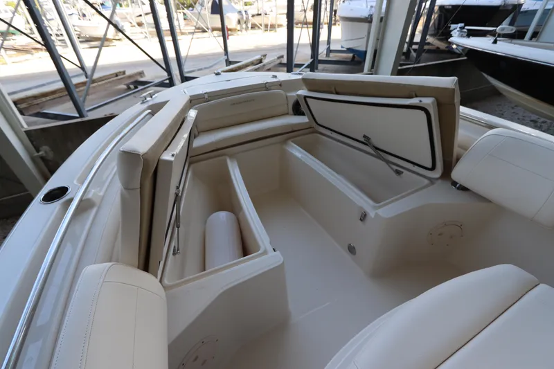 Slide: The Image of 2024 Grady-White Fisherman 216 boat interior with open storage compartments. - 31