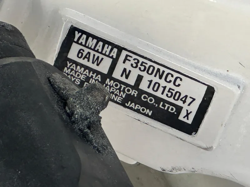 Slide: The Image of Yamaha F350NCC engine label on 2017 Pursuit OS 355 Offshore boat. - 26
