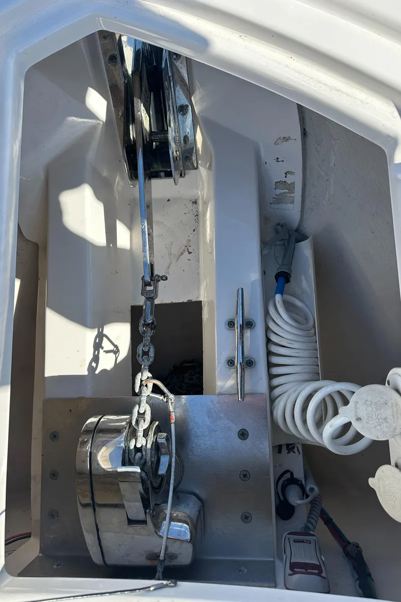 Slide: The Image of Anchor winch system on 2017 Pursuit OS 355 Offshore boat. - 28