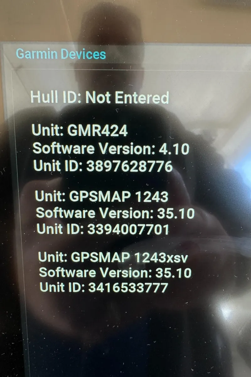 Slide: The Image of Garmin device screen displaying software versions and unit IDs for Pursuit OS 355 Offshore, 2017. - 35