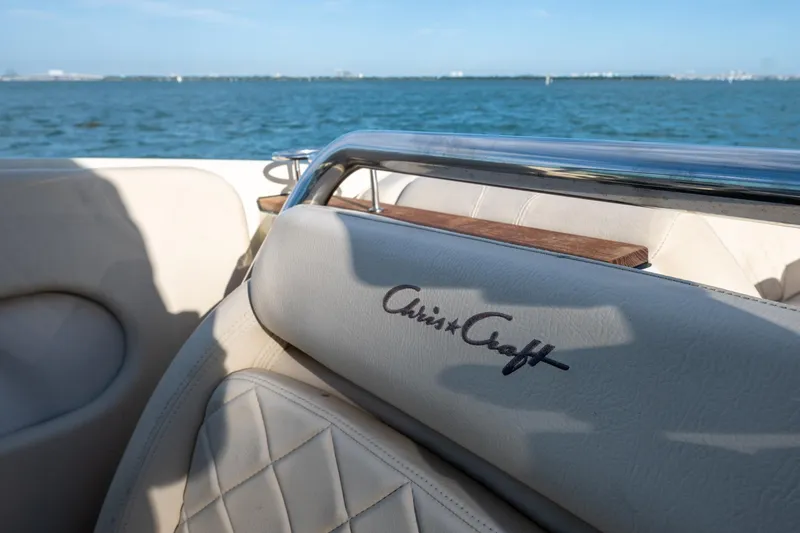 Slide: The Image of 2014 Chris-Craft Launch 32 boat interior with logo, ocean view in background. - 31
